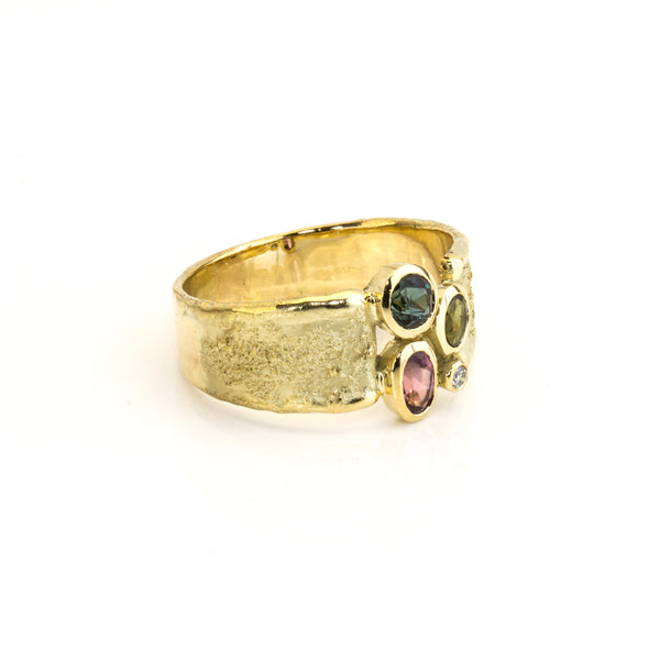 Gelbgoldring mit Turmalinen und Brillanten