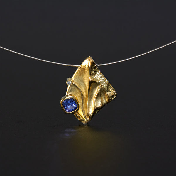 Anhänger aus Gelbgold mit Tanzanit und Brillant