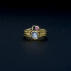 Gelbgoldring mit Stern-Safir und Rubin